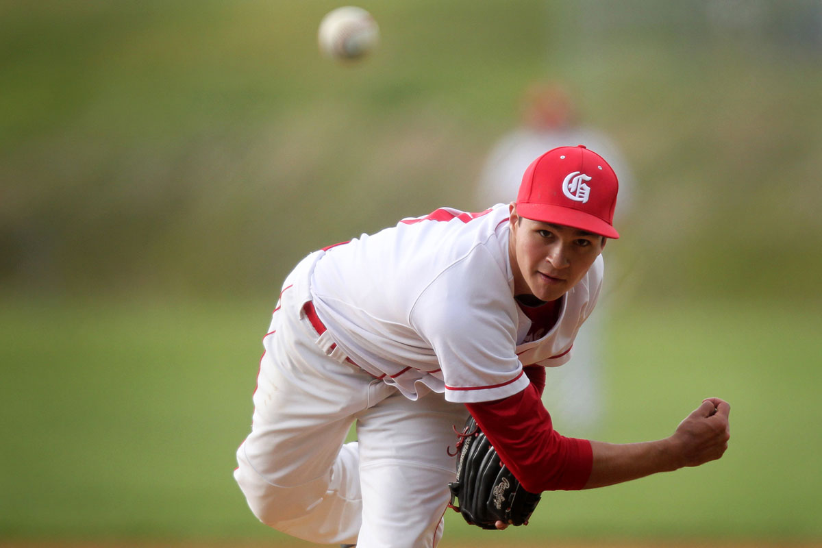 Glenelg, MD 042412 Staff Photo by Jen Rynda  Glenelg's Logan Dubbe pitches during the baseball game against River Hill at Glenelg High School in Glenelg, MD on Tuesday, April 24, 2012.